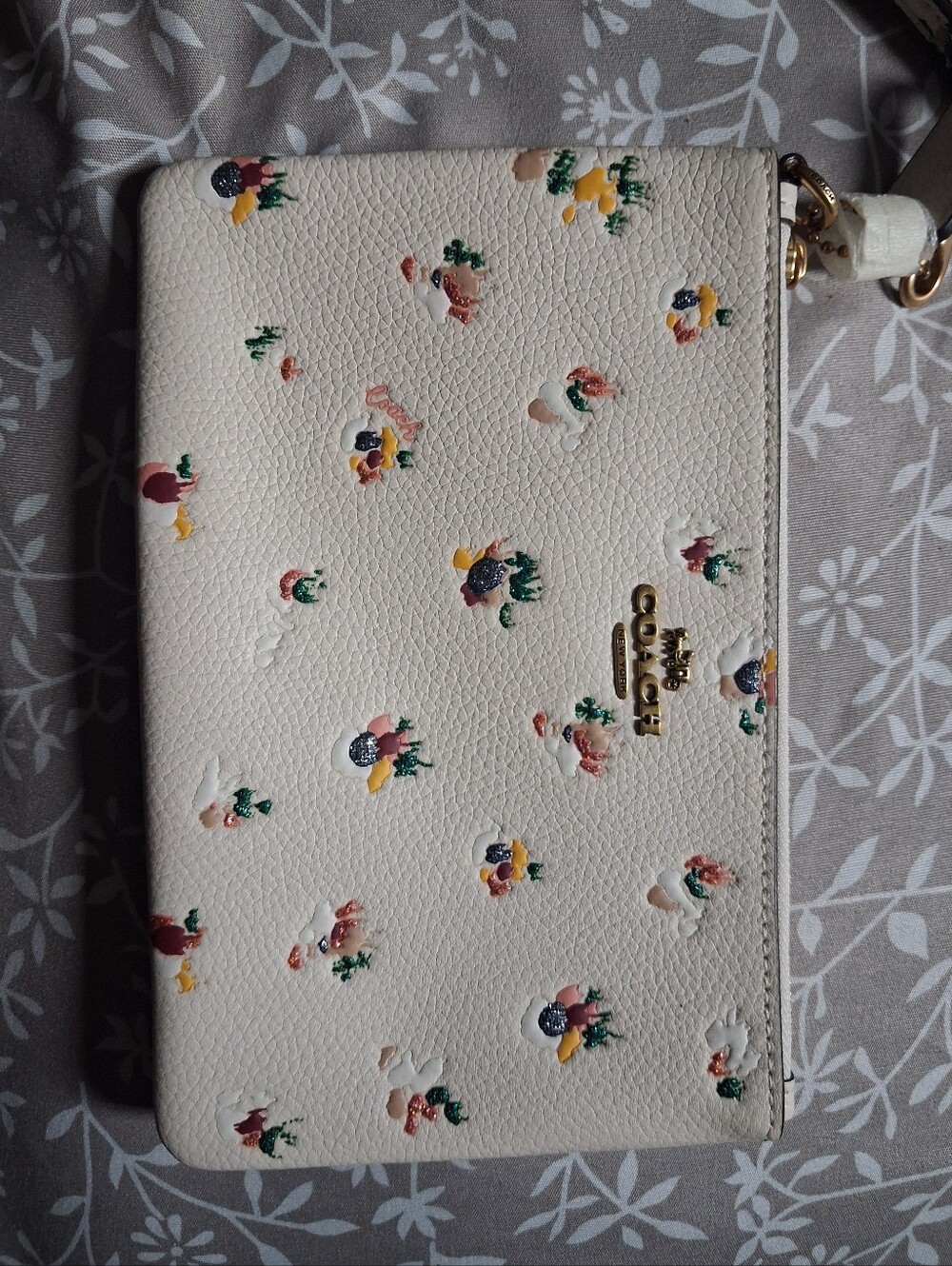 Coach Cream Pebbled Leather Floral Wristlet with Gold Logo